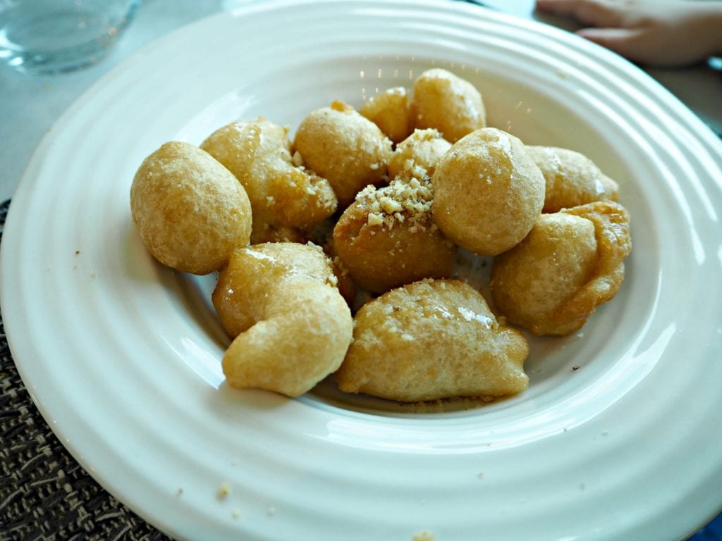 loukamades - greek doughnuts served with honey